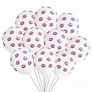 White balloons with red lip print on a white background