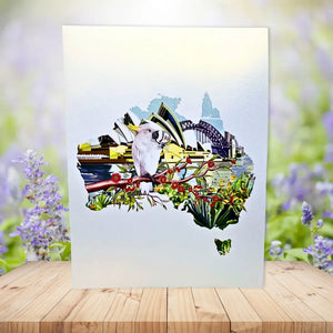 Cockatoo sitting among red gumnut blossoms 3D greeting card cover