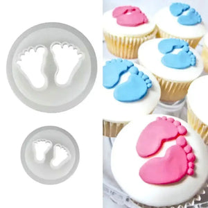 mini baby footprint fondant decorations on cupcakes