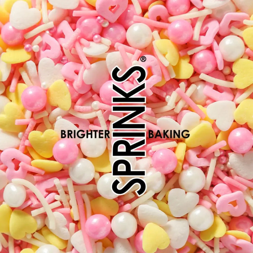 Pastel pink white and yellow cupcake sprinkles