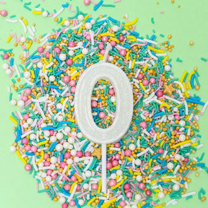 White glitter birthday cake candle number 0 design