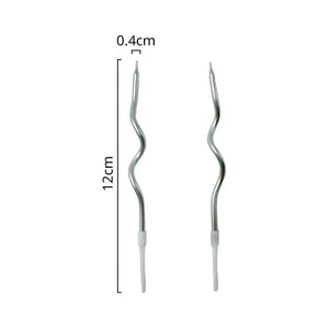 Curved silver candles for party cake