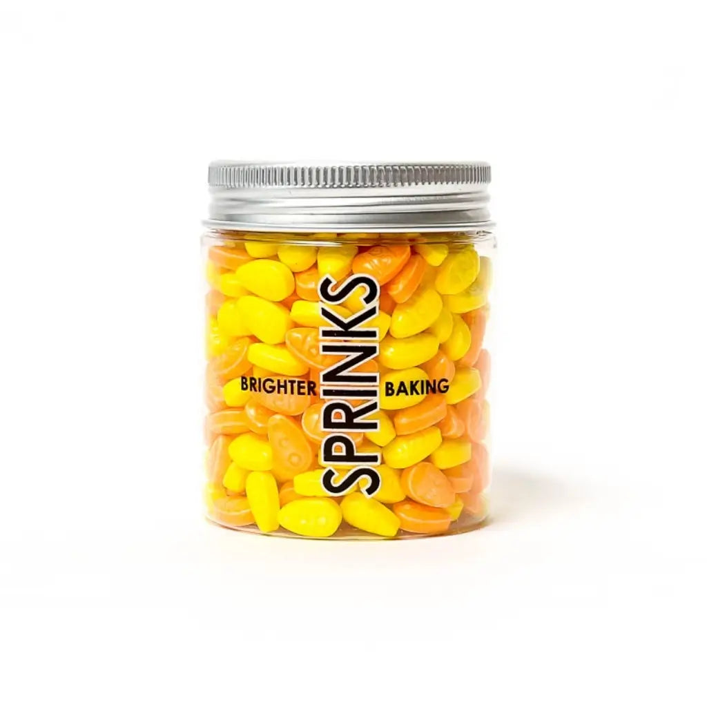 Yellow and orange Easter sprinkles in jar by Sprinks