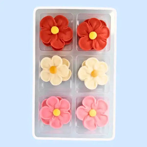 Royal icing flower cupcake decorations