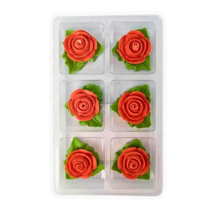 Tiny red edible rose cake decorations with leaves