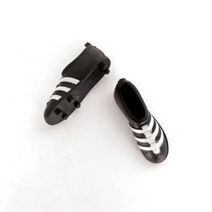 Black and white plastic soccer boot cake decorations