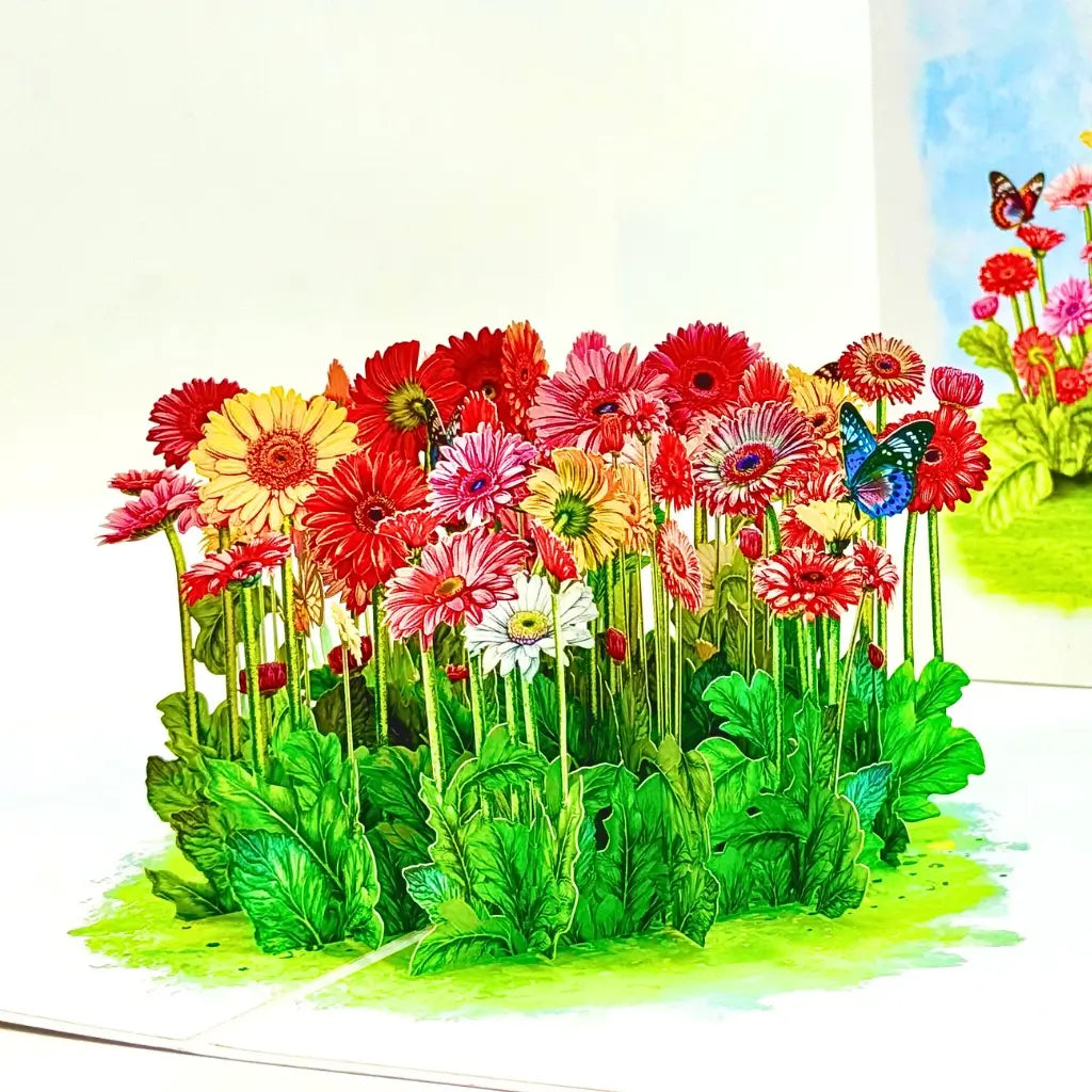 Inside view of 3D pop-up card with gerbera daisies and butterflies