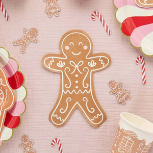 Smiling brown gingerbread man napkins with white icing details for Christmas parties