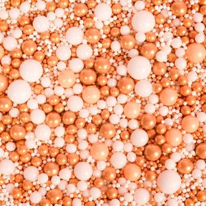 Gold champagne cake sprinkles with pearls and dragees