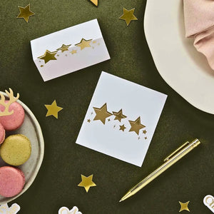 Set of 10 gold star place cards for festive and winter table settings