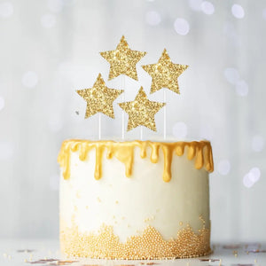 Gold glitter star cake toppers on picks