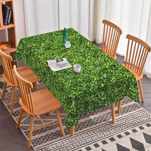 Green leaves and grass patterned polyester table cover on dining table