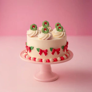 Edible Christmas wreath cupcake toppers in an eight pack