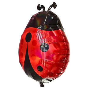 Helium ladybug balloon with red wings, black dots, and antennae