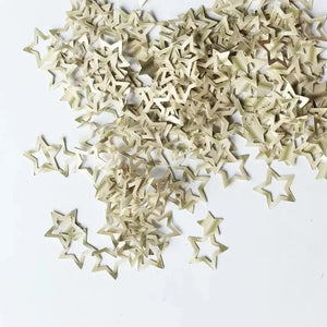 Biodegradable ivory paper star confetti for decorating party tables