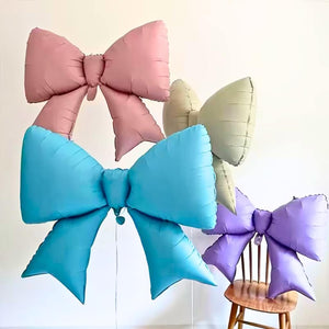 Jumbo Ribbon Bow Knot Foil Balloon in red, white sand, metallic gold, pastel purple, pastel pink & pastel blue