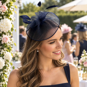 Navy wedding guest fascinator headband with an angled mesh disc