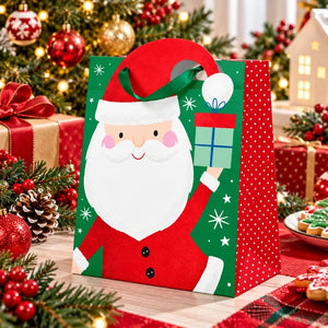 Kids’ Christmas present bag featuring Santa holding a gift