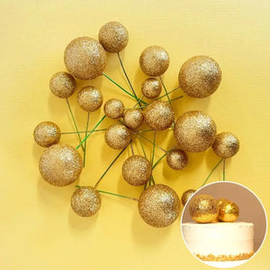 Glitter gold cake topper balls in assorted sizes