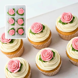 Royal icing pink rose decorations for baby shower cakes