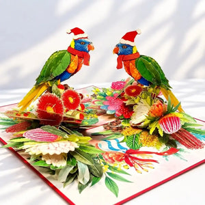 Rainbow lorikeet Christmas card surrounded by Australian native flowers