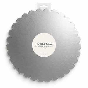 Metallic silver round cake board with decorative scalloped edging