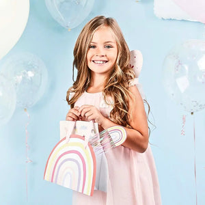 Pastel iridescent rainbow paper party bags for kids’ birthday celebrations