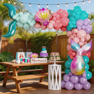 Under the Sea balloon garland featuring mermaid tail and seashell balloons.
