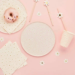 Pastel pink floral paper plates with white daisies and brown centres