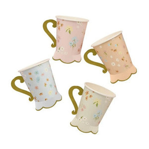 Pastel pink daisy party cups matching floral plates and napkins