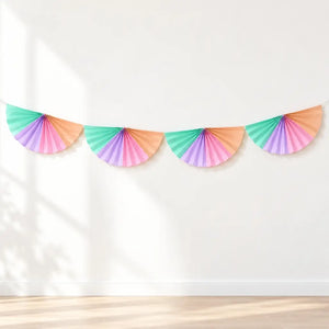 Pink lilac mint and peach paper fans joined as a party garland