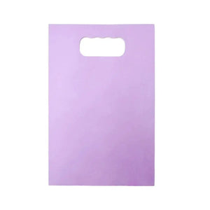 Purple paper treat bags for party giveaways