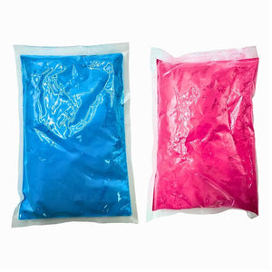 Two bags of blue and pink powder for soccer ball gender reveal