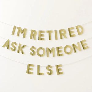 Metallic gold I'm Retired Ask Someone Else party banner