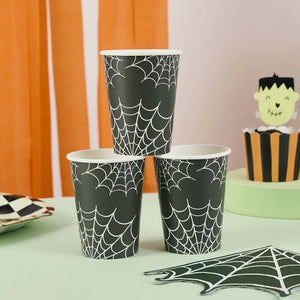 Black paper cups with white spiderweb Halloween design