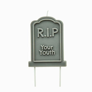 Tombstone-shaped “RIP Your Youth” birthday candle for milestone birthdays