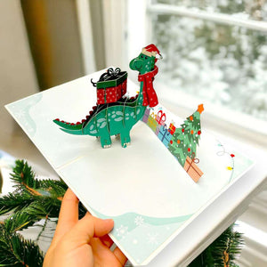 Green Baby Dinosaur with Christmas Present Pop Card