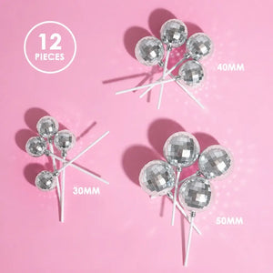 Silver disco cake toppers in three assorted sizes