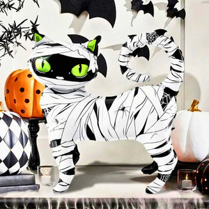 spooky black cat wrapped in mummy gauze balloon