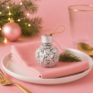 Sprinks Silver Noel Christmas sprinkles inside a glass JOY bauble