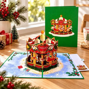 Three-dimensional Christmas carousel card displayed on a snowy base