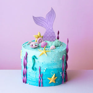 mermaid themed cookies shaped like tails