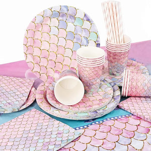 Pastel mermaid scale patterned tableware including plates, cups, and straws