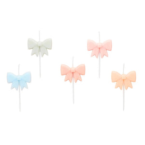 White and yellow daisy flower candles for birthday cake or garden party