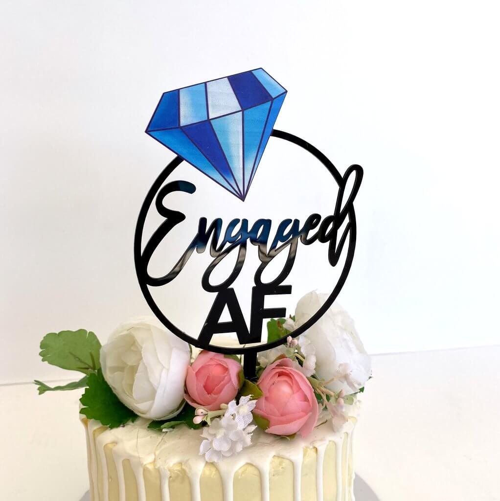 Acrylic Black Engaged Loop with Blue Diamond Cake Topper