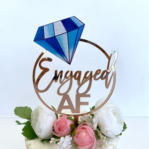 Acrylic Rose Gold Mirror Engaged Loop with Blue Diamond Cake Topper