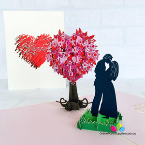 Handmade Silhouette Couple Kissing Near Pink Heart Tree 3D Pop Up Card - Online Party Supplies