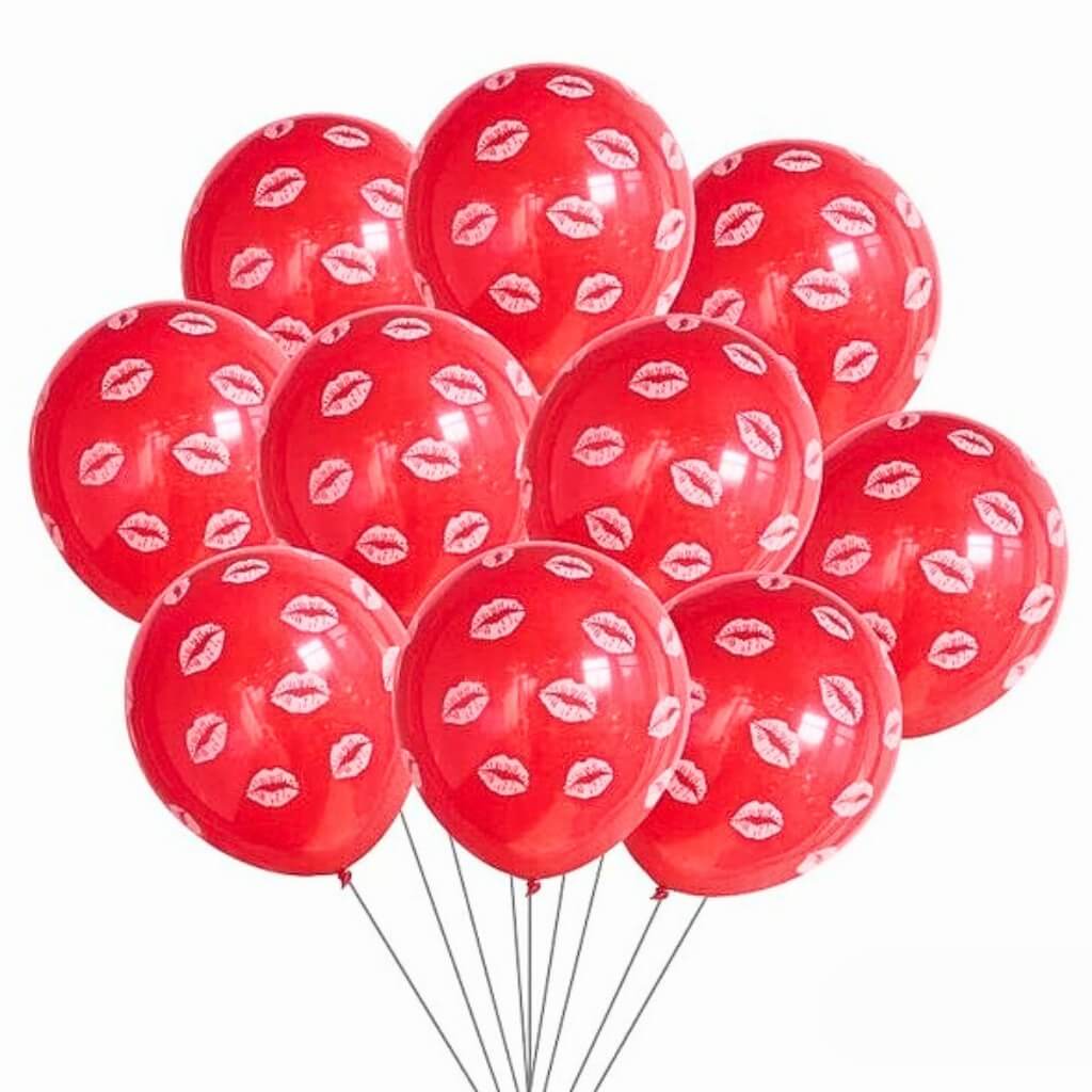 Red balloons with white lip prints on a white background
