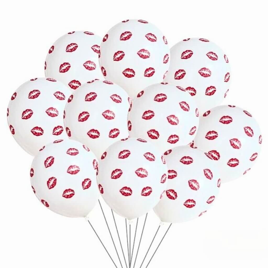 White balloons with red lip print on a white background