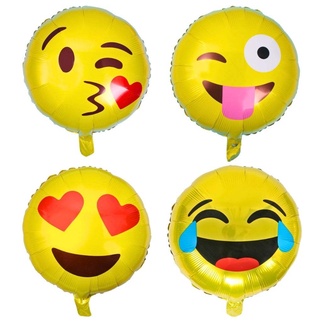 Four emoji-themed round foil balloons with different facial expressions on a white background